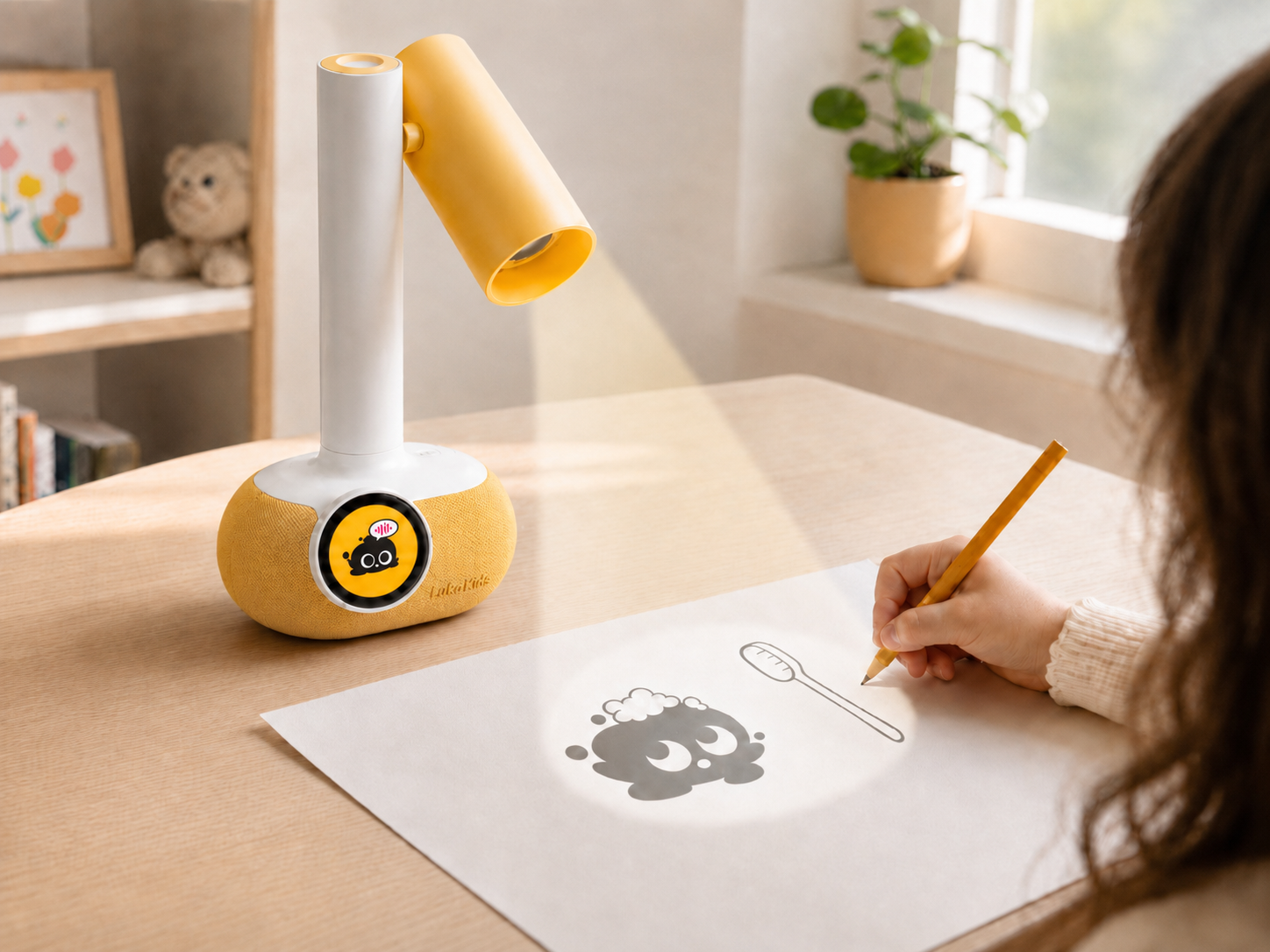 Child drawing over the simple shape the Drawing Projector projects on plain paper